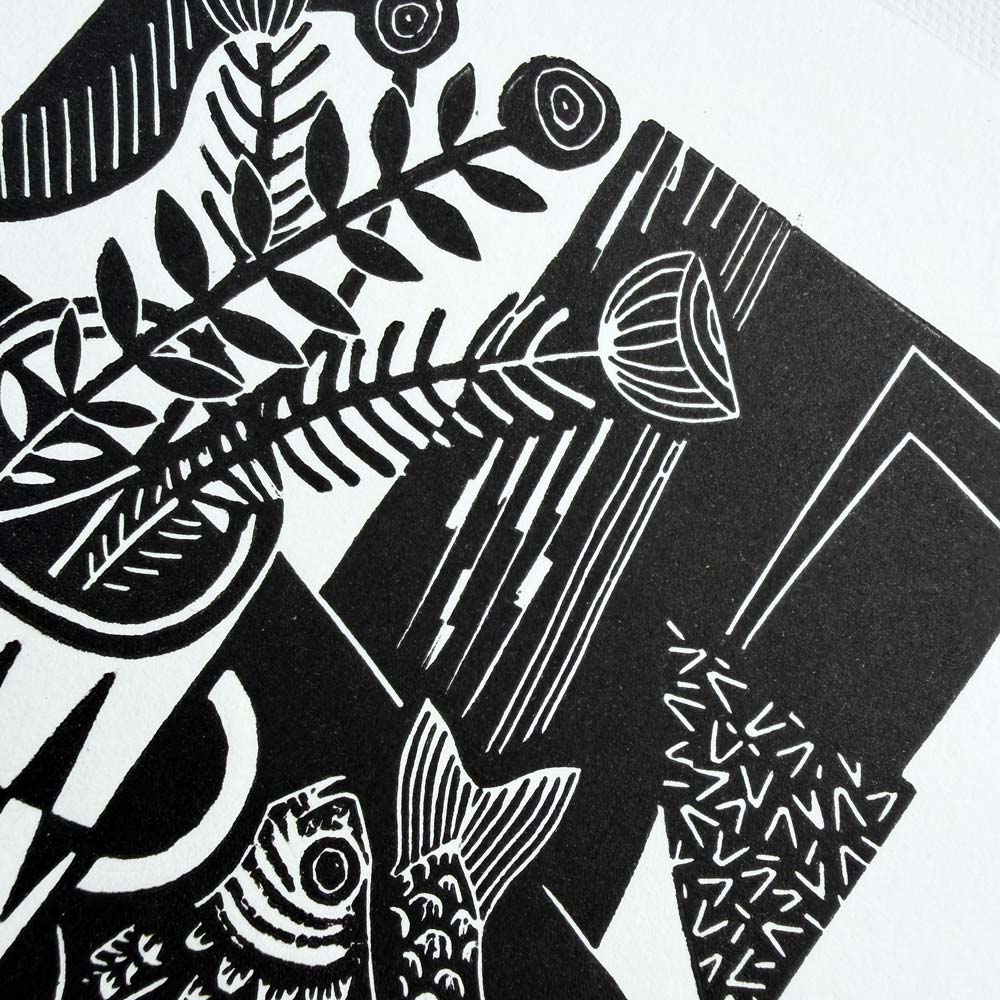 Graphic abstract Black and white still life linocut print showing flowers in a vase surrounded by textures and fish