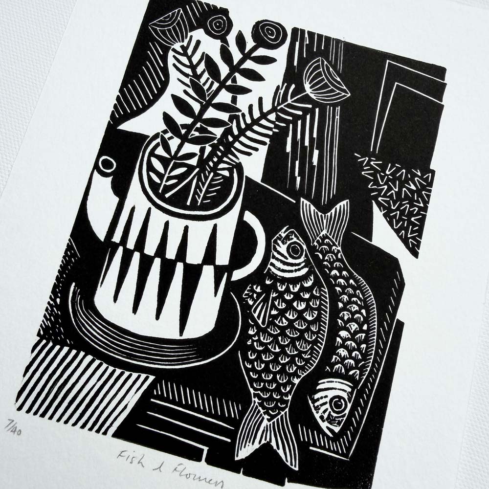 Graphic abstract Black and white still life linocut print showing flowers in a vase surrounded by textures and fish