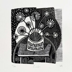 Monochrome black and white linocut of a plant in a vase on a table. The image is textured and slightly abstract